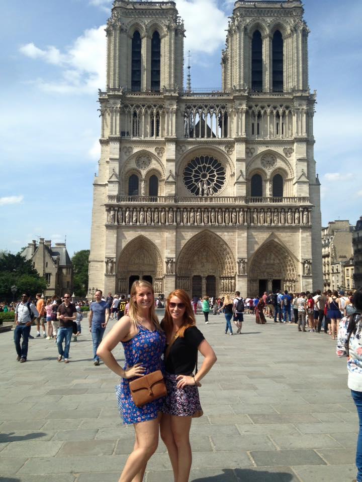 Two students in front of Notre Dame
